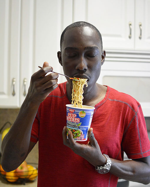 Chris Smith a.k.a. CLS, by all indications enjoying Nissin's new vegetarian option of Cup Noodles in Columbus Georgia during a Social Media Campaign.