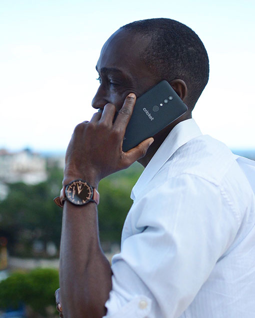Chris Smith a.k.a. CLS, on the phone for the launch of one of Cricket Wireless' new handsets.