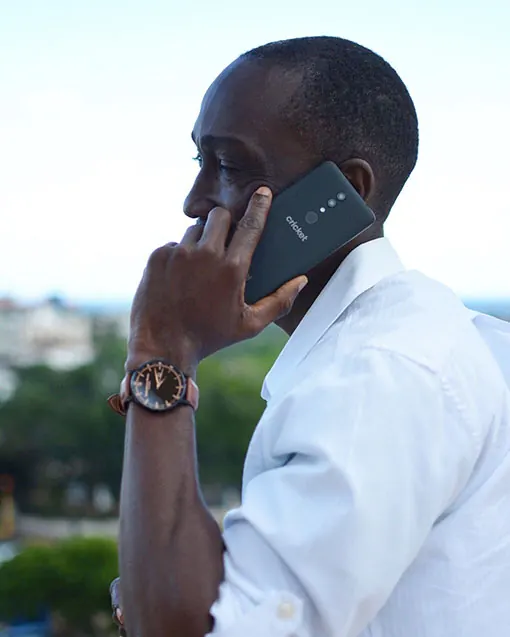Chris Smith a.k.a. CLS, on the phone for the launch of one of Cricket Wireless' new handsets.