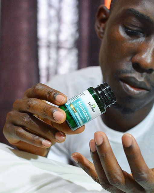 Chris Smith a.k.a. CLS, preparing for a good night's sleep with Swanson's Ultra Melatonin, during one of their partnerships to promote the brand's supplements.