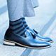 Chris Smith a.k.a. CLS, in a close-up featuring him wearing loafers in an Instagram post.